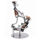 Gave til tandlæge metalfigur med humor