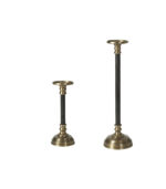 Elegante antik-gyldne lysestager i vintagestil 