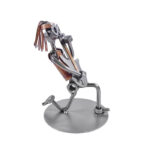 Rockguitarist metalfigur gave til mand eller kvinde