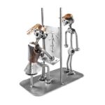 Gave radiograf med patient metalfigur til radiolog svendegave