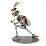 inliners løber metalfigur som gaveide til kvinde med inliners eller rulleskøjter