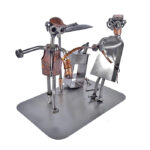 Ortopædkirurg og flygtende patient metalfigur