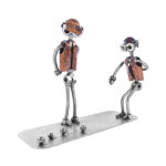 Petanque spiller på banen metalfigur som gave ide til petanquespiller