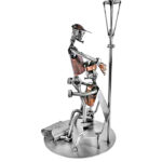 Sex på bænk metalfigur som gave til sexpartner eller sexklub