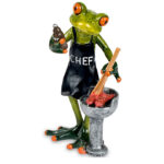 Kok eller grillmester frø griller bøf som gave til grillmester