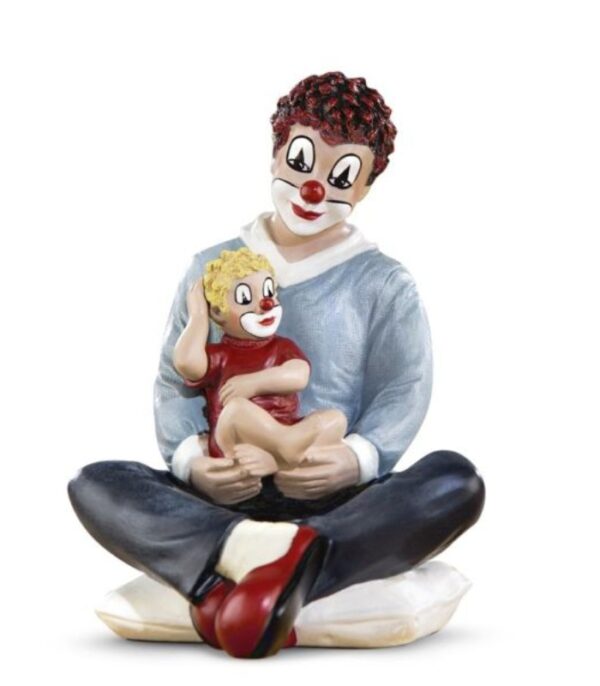 klovn beskytteren med et barn i skødet. flotte klovnefigurer